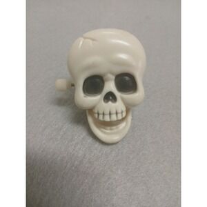 Vintage Halloween Wind Up Laughing Skull Toy Skeleton Brooch Badge Clip